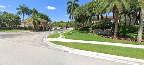 Photo of 752 NW 127th Ave, Coral Springs, FL 33071 (MLS # A11869810)