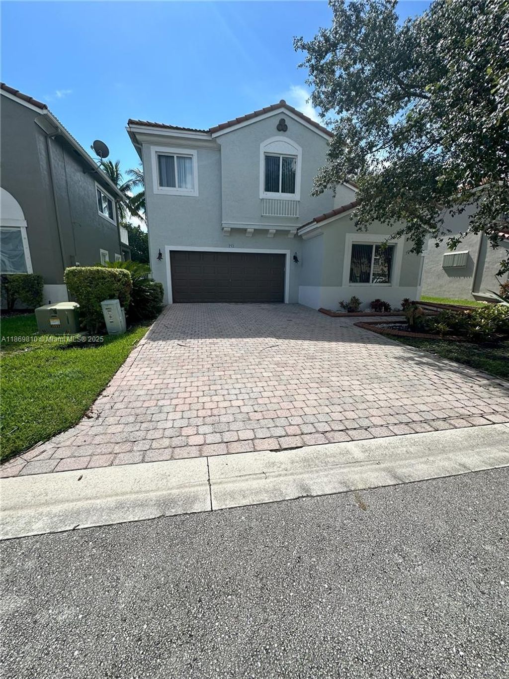 Photo of 752 NW 127th Ave, Coral Springs, FL 33071 (MLS # A11869810)