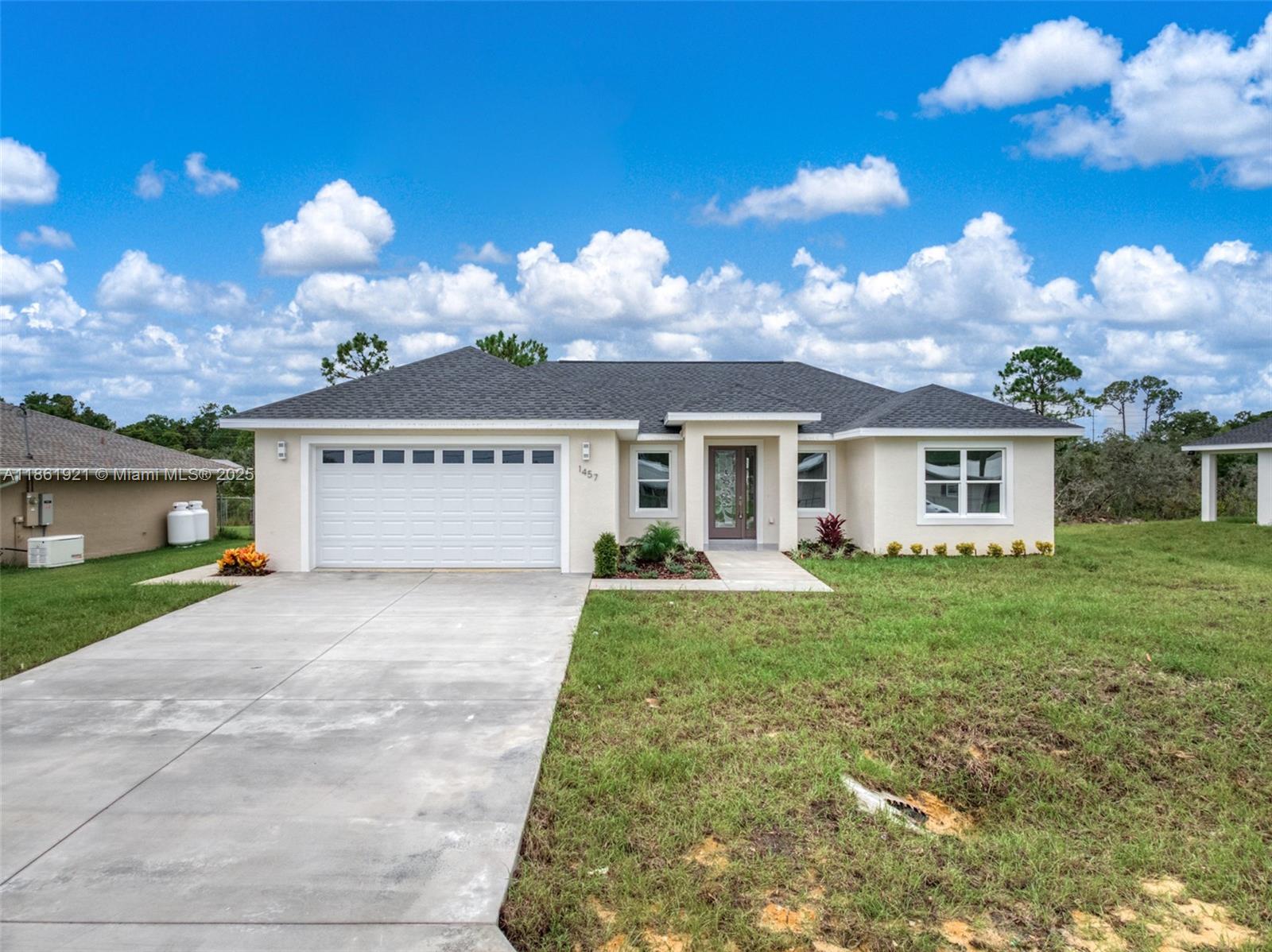 Be the first to own this brand-new home in Sebring County Estates! Offering 1,687 sq ft of living space (2,440 sq ft total), this 3-bedroom, 3-bath residence is thoughtfully designed with a split floor plan that maximizes both privacy and functionality. The interior showcases durable LVP flooring and a bright, open layout, creating a welcoming atmosphere throughout. The kitchen comes fully outfitted with premium Samsung appliances, blending style and efficiency for everyday living. Step outside to the open lanai patio, where you can take in views of the spacious backyard—ideal for gatherings or quiet relaxation. An attached 2-car garage, septic system, and modern finishes throughout complete this well-rounded home.