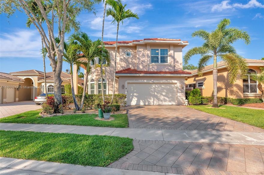 Welcome Home To This Luxurious 4-bedroom, 3-bathroom + Den Two-Story home located in the exclusive desired community of Heron Bay. This elegant home in The Point At Heron Bay features soaring high ceilings, a bright and open floor plan, and a brand-new roof (2025) for peace of mind. The spacious kitchen flows seamlessly into the living areas, perfect for entertaining all of your family and friends. Step outside to your private screened-in pool and covered patio ideal for relaxing or hosting outdoor gatherings year-round. The versatile den offers the perfect space for a home/office, gym, or guest room. Experience resort-style living with top-rated schools, clubhouse, tennis, fitness center, beautifully greenery, 24/7 gated security and much more. This is South Florida living at its finest!
