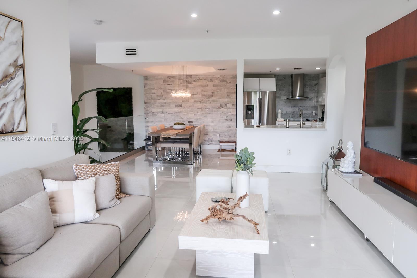 Step into this beautifully remodeled 3-bedroom, 2-bath apartment featuring white porcelain floors, a sleek modern kitchen with elegant stone style countertops, and stainless steel appliances. The spacious open layout includes two walk-in closets, remodeled bathrooms, and generous storage throughout — perfect for both comfort and style.
Located in a well-maintained community with access to a sparkling pool and a children’s playground, this apartment offers the ideal blend of luxury and livability in one of Doral’s most desirable neighborhoods.