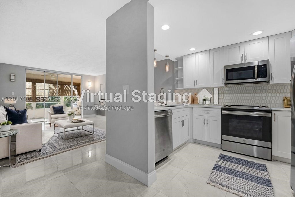 Photo of 7100 NW 17th St #305, Plantation, FL 33313 (MLS # A12017511)