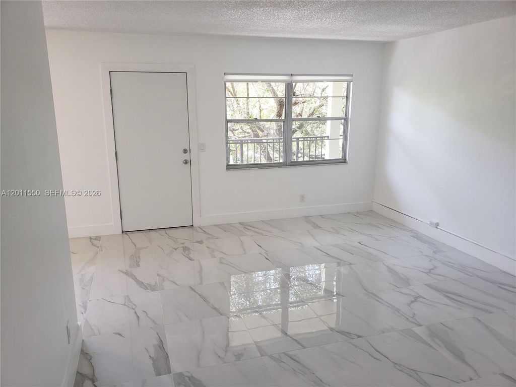 Photo of 13255 SW 7th Ct #305D, Pembroke Pines, FL 33027 (MLS # A12011550)