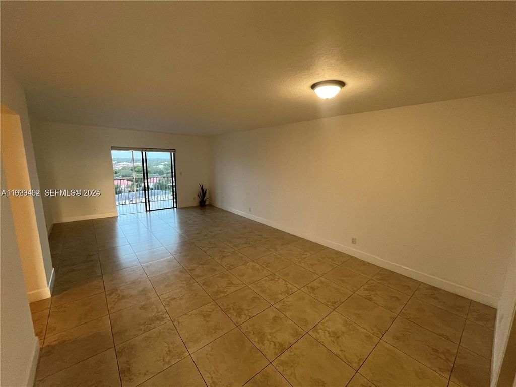 Photo of 3575 Broken Woods Dr #1002, Coral Springs, FL 33065 (MLS # A11929402)
