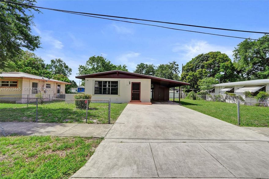 Fantastic area, great lot, room for expansion. Perfect home for first home buyers, or investors. 
New accordion shutters, roof is approx 10 years old, good condition. Original terrazzo flooring and ceramic tile. Vaulted living room/dining room ceiling.  New fixtures in the bathroom. New electrical box, outside storage and laundry hookup, carport and additional parking in the driveway, sold as is. Text listing agent for additional info and appointments