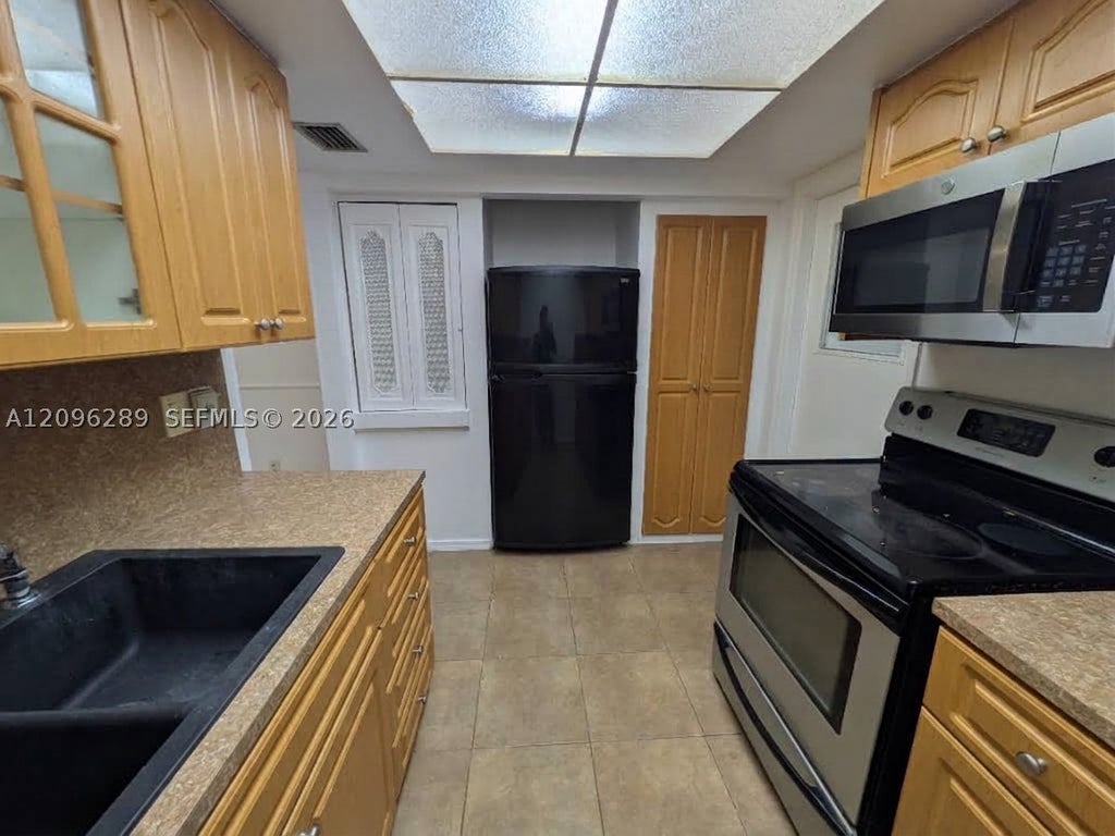 Photo of 1326 SW 75th Ave, North Lauderdale, FL 33068 (MLS # A12096289)