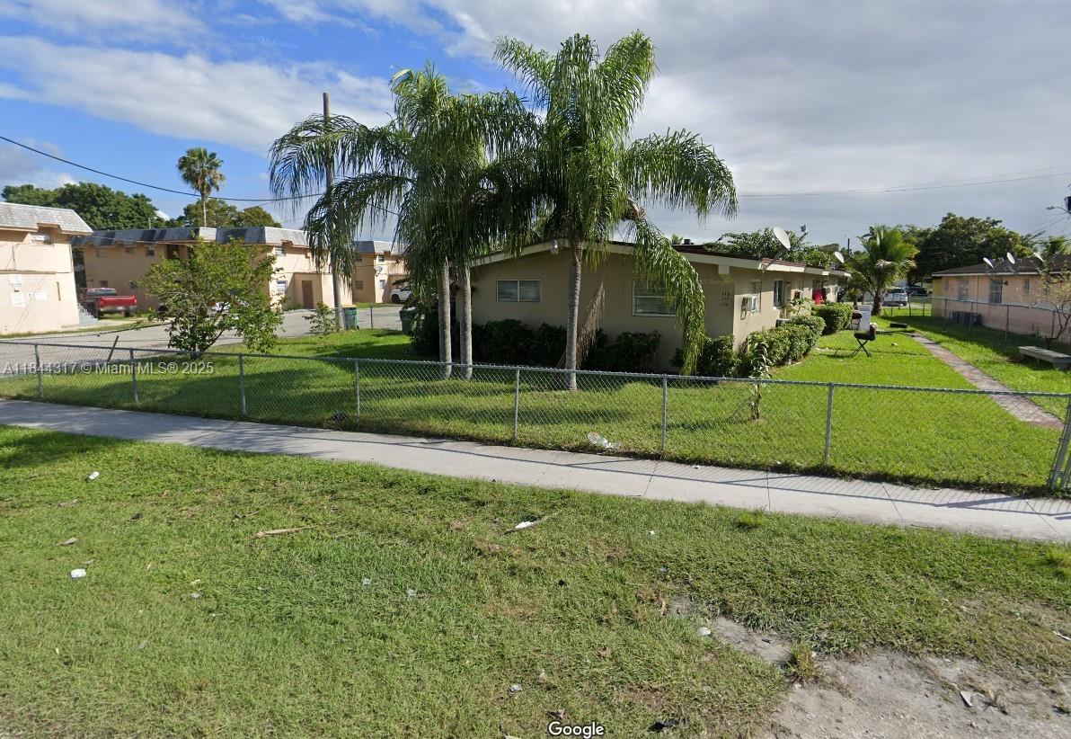 2 Bed 1 Bath terrazo floors with back yard, rent includes water