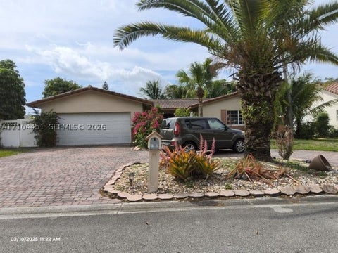 Photo of 11093 Glenwood Dr, Coral Springs, FL 33065 (MLS # A12104451)