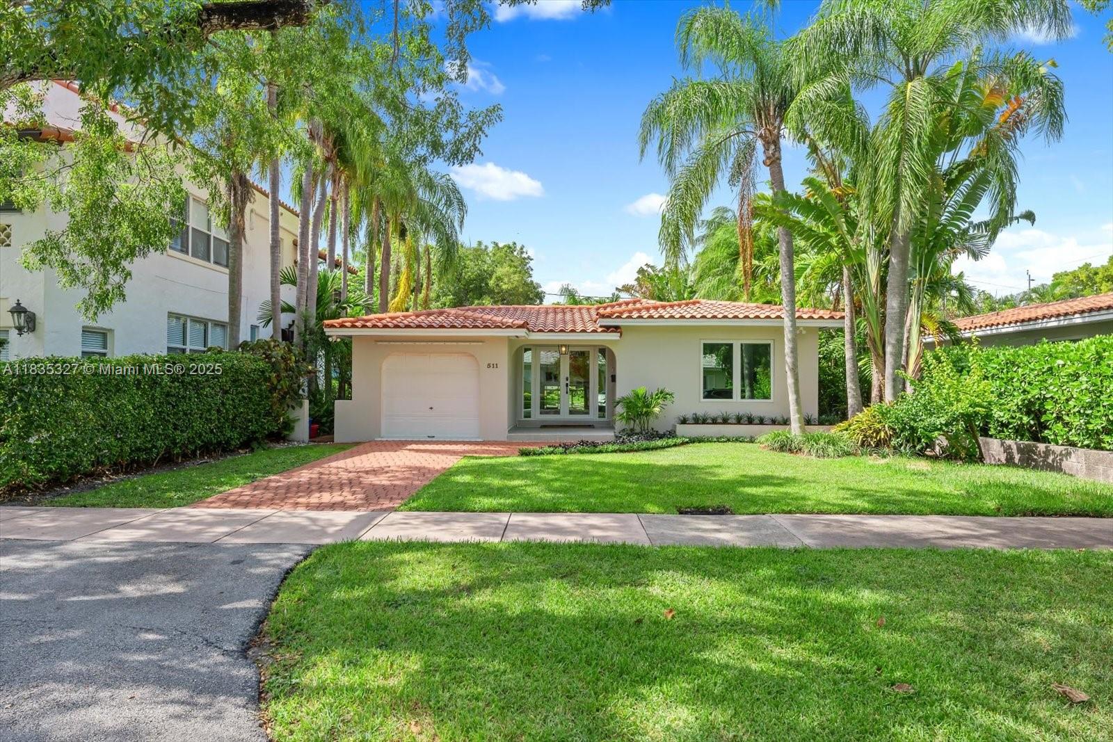 Beautifully remodeled home in the heart of Coral Gables, walking distance to Miracle Mile, the Biltmore Hotel, Youth Center, and Library. Features all-new plumbing, electrical, AC ductwork, and impact windows/doors for abundant natural light. Sleek porcelain tile flooring, high-hat lighting, updated kitchen/baths, and brand-new appliances including washer/dryer.
Smart home upgrades include ADT system with cameras, Ring doorbell, Nest thermostat, and electric blinds. Enclosed, air-conditioned garage offers flex space for office/gym/guest room, with a removable wall and continuous tile beneath. Covered patio and mature palms complete the picture. City sewer. Move-in ready and ideally located—this one won’t last!