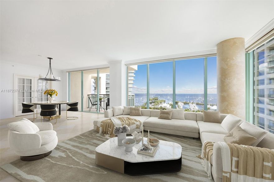 Luxury 3BR/3.5BA residence with 2,227 SF in The Executive Residences at The Ritz-Carlton Coconut Grove. Located on the 14th floor, this spacious unit offers stunning bay and city views, marble flooring, floor-to-ceiling windows, and an expansive balcony. Gourmet kitchen features granite countertops and premium appliances. Split floor plan with oversized primary suite, walk-in closet, and spa-like bath. Includes 1 assigned garage space. Enjoy full access to Ritz-Carlton amenities: 24-hr concierge, valet, doorman, fitness center, pool, spa/hot tub, and more. Ideally situated in the heart of Coconut Grove, near parks, marinas, dining, and shops.