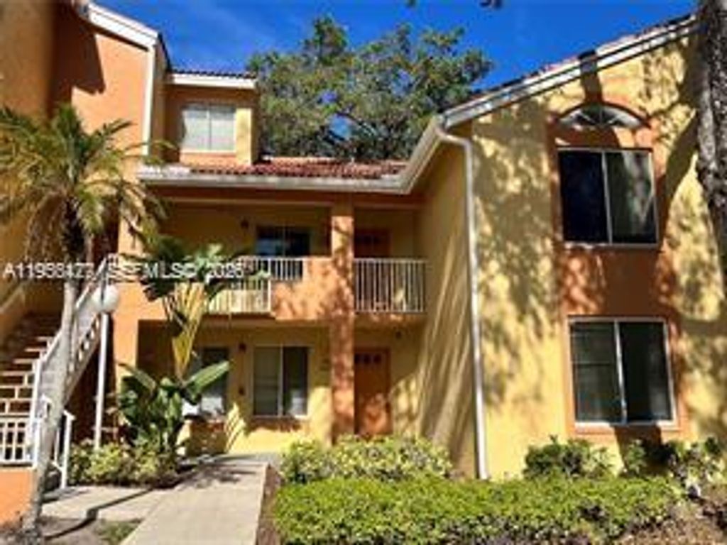 Photo of 1013 Coral Club Dr #1013, Coral Springs, FL 33071 (MLS # A11956477)