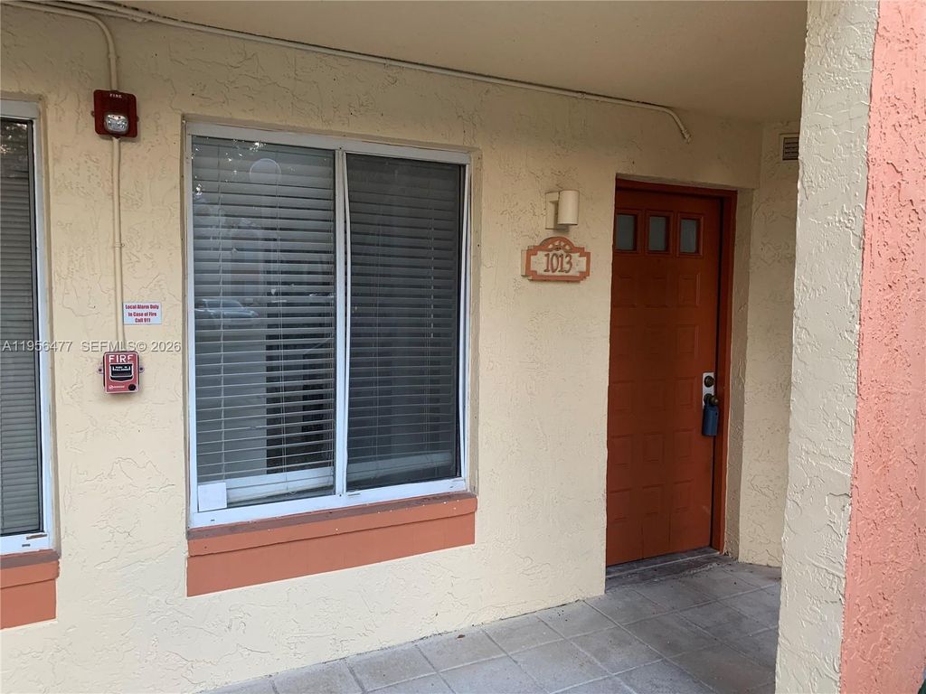 Photo of 1013 Coral Club Dr #1013, Coral Springs, FL 33071 (MLS # A11956477)