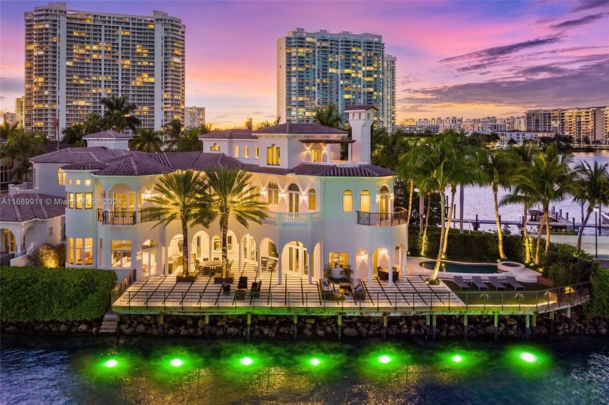 Experience unparalleled luxury in this private waterfront estate with open bay views – a rarity in Aventura, offering 5 bedrooms, 6 full baths, & 2 half baths. Situated along 251’ of expansive bayfront in Aventura—a city celebrated for its upscale lifestyle, world-class shopping, & vibrant community—this tri-level residence’s exquisite finishes include marble & walnut wood floors, a grand principal suite & waterfront terraces for every bedroom. Designed to seamlessly blend relaxation & entertaining, the home features a summer kitchen, oversized backyard, custom seating areas & a pool with spa. With meticulous attention to detail & thoughtfully curated features, this property embodies the pinnacle of refined waterfront living in one of South Florida’s most sought-after locations.