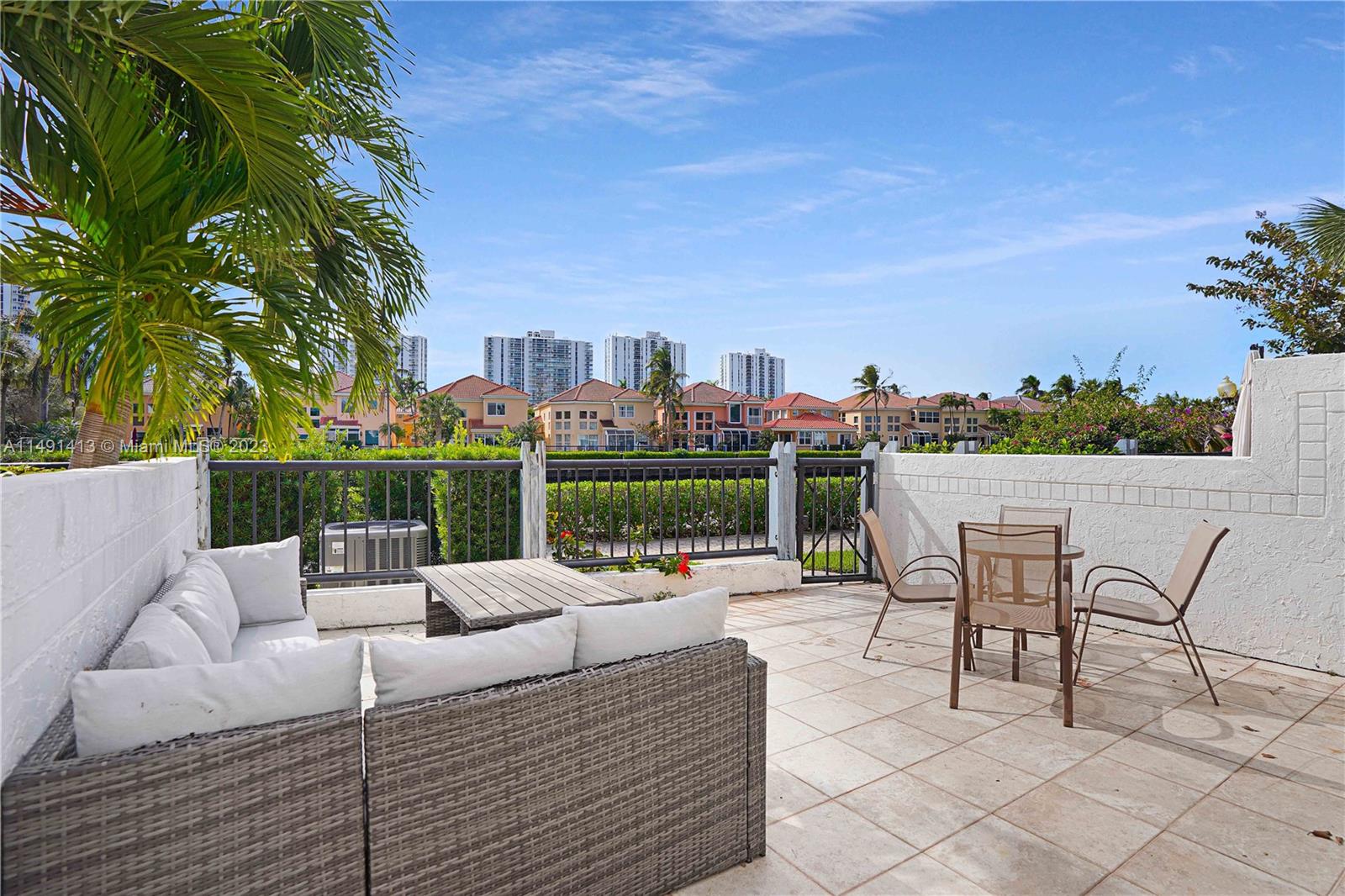 Unique opportunity to rent in Aventura's prestigious Golden Pointe community. Sought-after & rarely available waterfront gem enjoys an amazing water-facing patio. 1900 SF home features a large primary bedroom on the second level with private bathroom, private balcony, and high ceilings. Unfurnished. The upper level also presents two additional bedrooms with plenty of closet space and a well appointed full bathroom. The lower level highlights the direct access to the patio, floor to ceiling windows, plenty of light, and a generous living & dining areas ideal to entertain. Additional features include a massive wine cooler, semi open kitchen, breakfast area, laundry, 1 car garage plus a two car driveway. GP is located next to The Point surrounded by water. Close to schools and Aventura Mall.