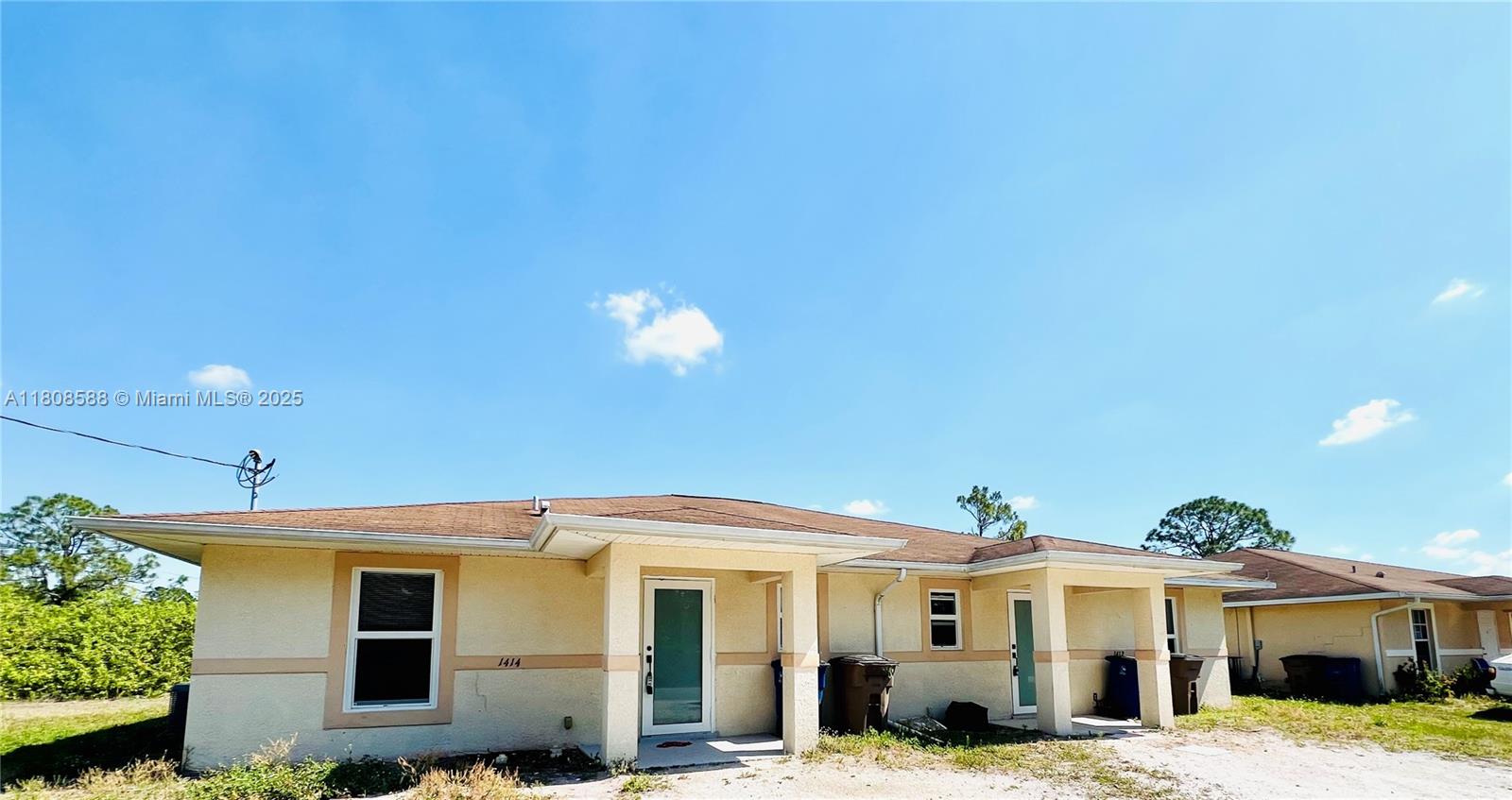 1414 W 12th St 1414, Lehigh Acres, Lee County, Florida - 3 Bedrooms  
2 Bathrooms - 