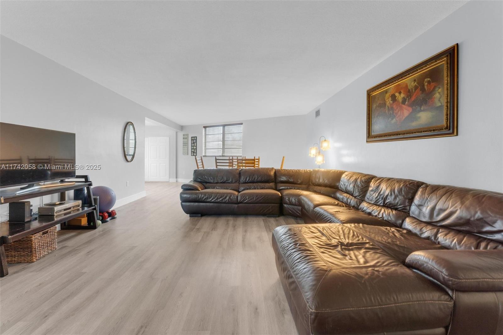 Located in the heart of North Bay Village. This condo features 2 Bedrooms , 2 Bathrooms on the 1st floor with a bonus room & 2 unassigned parking spots. The home has new laminate flooring throughout & new ceramic tile in the bathroom with recently upgraded kitchen cabinets. This is complimented by views of the pool and water. Great complex in a booming area with new construction all around it including a brand new Publix that will be walking distance soon. Appointments are fast & easy.