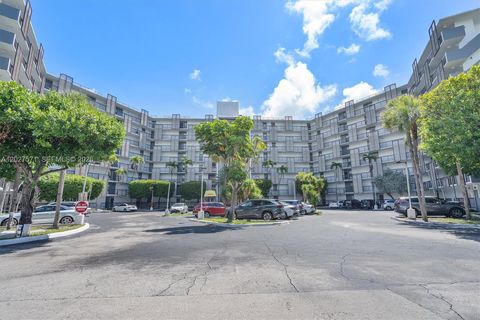 Photo of 20400 W Country Club Dr #214, Aventura, FL 33180 (MLS # A12027571)