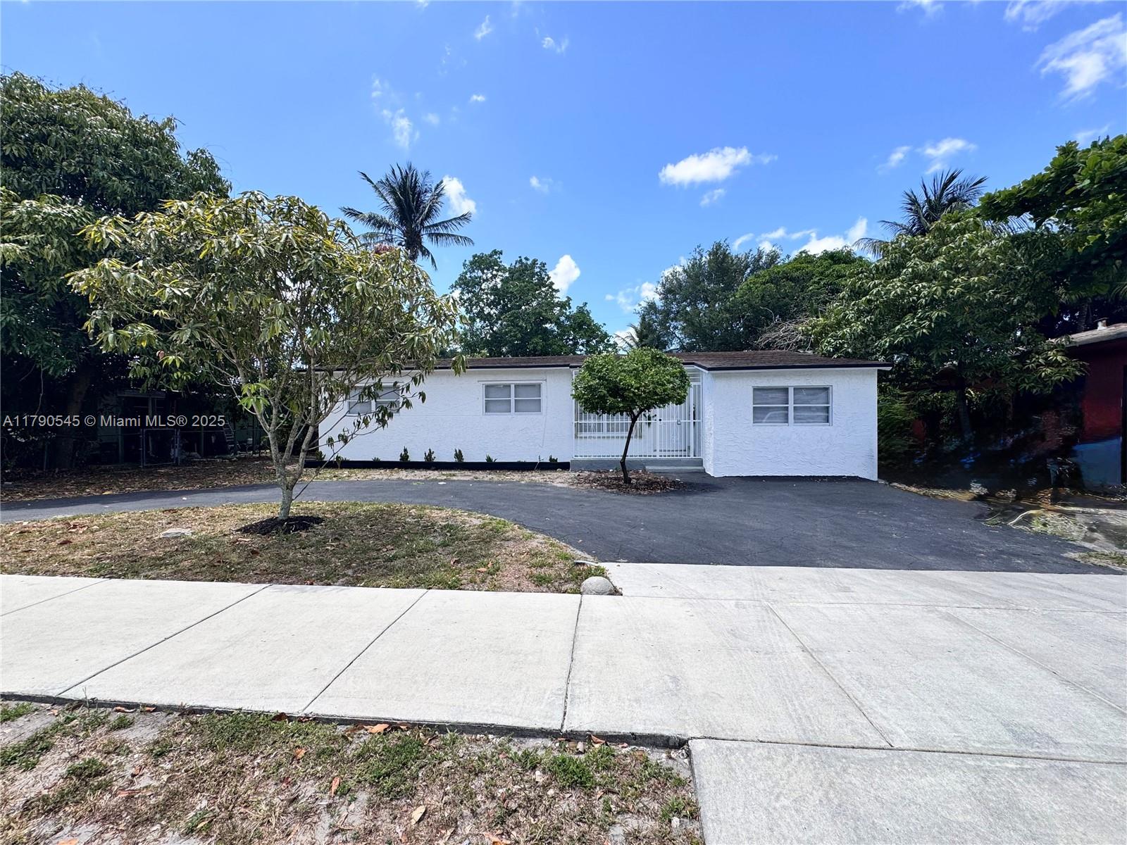 1310 NW 115th St