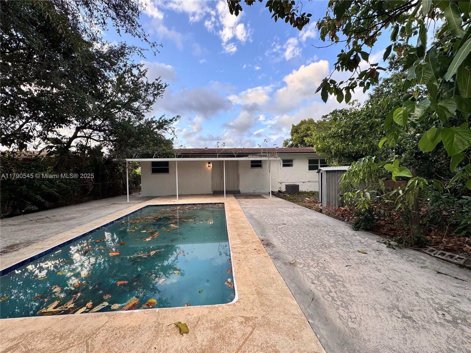 1310 Nw 115th St, Miami, Broward County, Florida - 4 Bedrooms  
2 Bathrooms - 