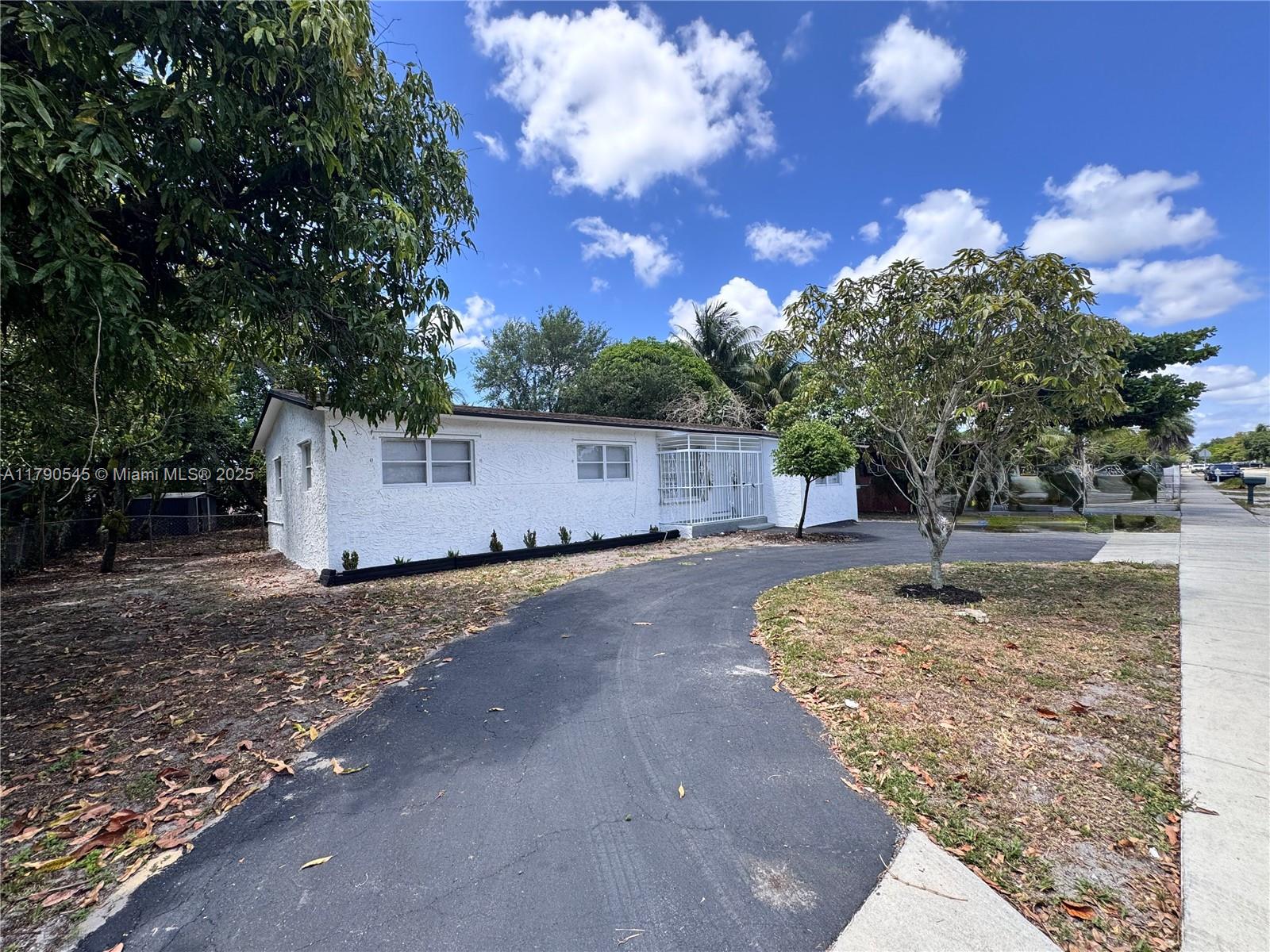 1310 NW 115th St