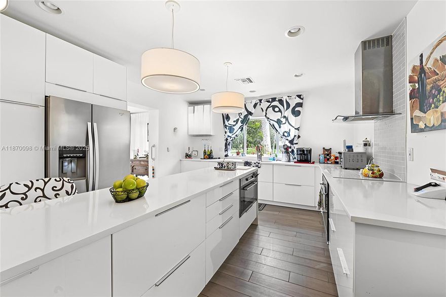 Welcome to the vibrant 55+ community of Coconut Creek! This charming single-family residence boasts 2 spacious bedrooms and 2 bathrooms with a stunning kitchen featuring a 10 ft island that overlooks serene water views, complemented by tons of natural light. Step outside to your extended patio, and take advantage of fantastic community amenities like the refreshing pool and clubhouse. With impact windows and an assumable mortgage making it even more accessible, this corner unit is just minutes from the turnpike—