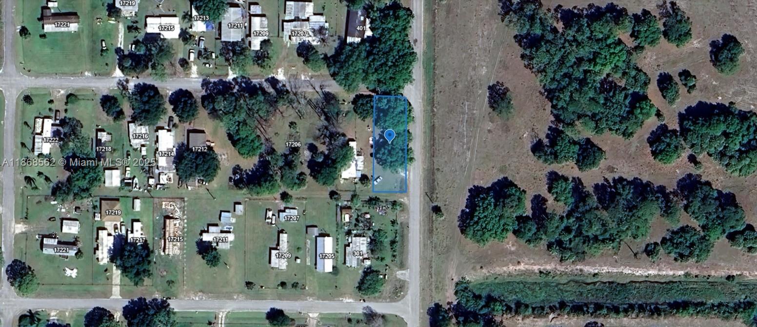 OWNER WILL FIANANCE!! 5K DOWN!!! $592.06 A MONTH FOR 60 MONTHS AT 7% INTEREST!!! MOBILE HOME LOT WITH NO HOA! Excellent opportunity to build your dream on a mobile-home-zoned lot centrally located in Okeechobee. Surrounded by a serene, rural environment, this property offers close proximity to outdoor recreation, including world-class bass fishing on Lake Okeechobee and the scenic multi-use trails of the Lake Okeechobee Scenic Trail. Whether you're into nature walks, horseback riding, or stargazing over the Kissimmee Prairie Preserve, it's all within easy reach. The property’s zoning supports placement of a mobile or manufactured home, providing flexibility and affordability in construction.