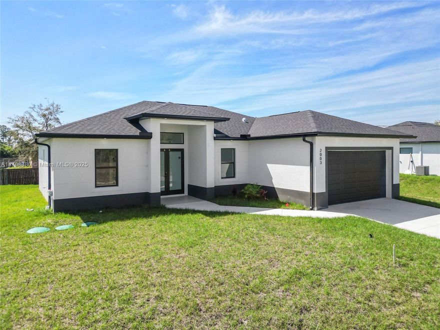 *OVERSIZED LOT* CO ISSUED! Step into this stunning property featuring 3 Bedrooms + Den, 2 Baths, and 1630 sqft of luxurious living space. Experience high-end finishes throughout, including elegant quartz countertops, modern stainless steel appliances, and secure impact windows and doors. Conveniently located just 15 minutes from Fort Myers and only 2 minutes from shopping and schools, this home offers the perfect blend of comfort and accessibility. The oversized lot is perfect for parking your truck, RV, or boat, and provides ample space for family gatherings and outdoor fun. The motivated seller is ready to assist with closing costs, making this an opportunity you won’t want to miss!