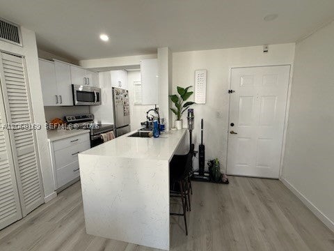 Photo of 8607 SW 68th Ct #27, Pinecrest, FL 33156 (MLS # A12068169)