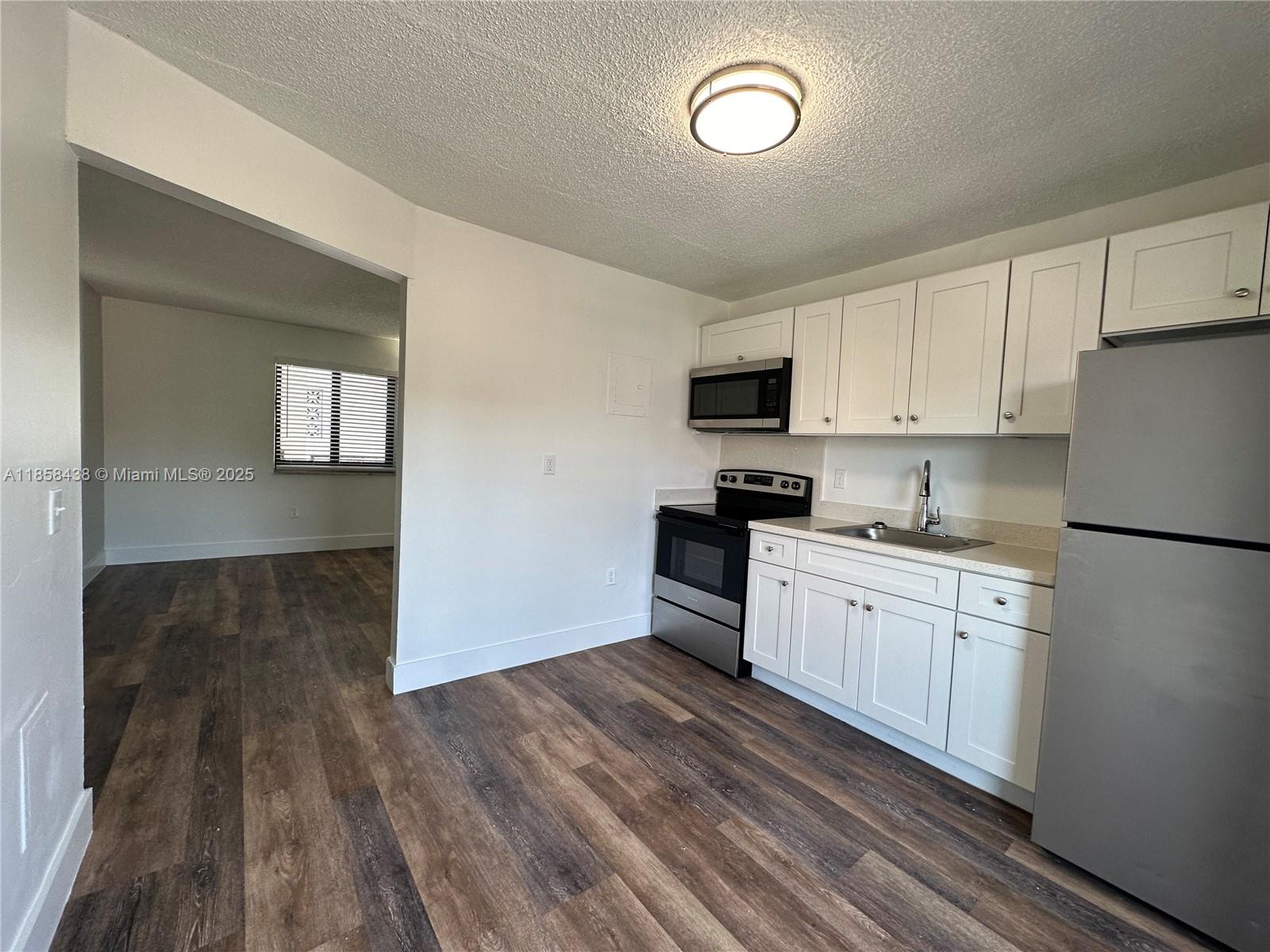 Gorgeous, fully remodeled 2 bed / 1 bath apartment in the heart of West Brickell! 2nd floor, corner unit - located in a brand new building on a private, gated property. This unit shines with new flooring, lighting, sleek cabinetry, granite countertops, and top-of-the-line appliances. Enjoy a beautifully updated kitchen & bathroom, impact windows & doors, central AC & your own private balcony. This charming building offers new laundry facilities in building & an elevator. Perfectly situated in a quiet residential area of West Brickell/Little Havana, live just steps away from parks, schools, shops, restaurants, bars, and close to major highways. Water, waste, sewer included. Assigned parking spaces only $50 a month. Turn key unit! Enjoy the best of city living with a cozy, neighborhood feel.