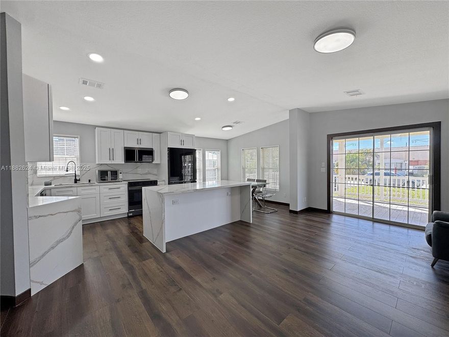 Beautifully updated mobile home with land included, offering modern upgrades and convenience in a prime location. Step into a brand-new kitchen featuring quartz countertops, wooden cabinets, Samsung appliances (all under warranty), Wi-Fi fridge, stove, dishwasher, microwave, and food disposal. Enjoy new wood laminate floors, LED ceiling lamps, and no popcorn ceilings. Bathrooms are fairly remodeled for added comfort. The home includes hurricane shutters, wooden wall with electric chimney, spacious porch, and cement staircase. Laundry is a breeze with a brand-new washer and dryer under warranty. Outside, you’ll find two storage sheds and parking for up to 4 cars. Just two blocks from Stirling Rd and shopping plazas, with quick access to I-95, great functionality, and location.