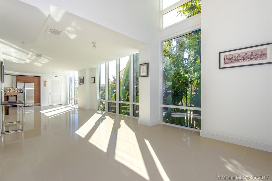 Alluring adobe at the LEED Gold certified CRIMSON CONDO! Surrounded by beautiful scenery & spectacular views overlooking the isles of Miami Beach & the vibrant city lights of Downtown, this sensational unit provides floor to ceilings windows, Italian cabinetry, granite counter tops, SS appliances, impeccable floors & 2 parking spots! This 'Green' Building offers: fitness center, yoga room, resort style pool deck, theater, cyber cafÃ© and close proximity to your favorite restaurants, shops & entertainment.