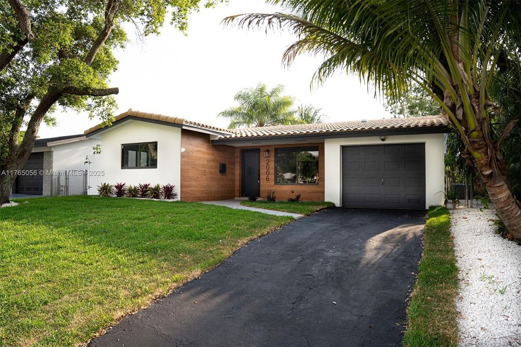 Photo of 2006 N 37th Ave, Hollywood, FL 33021 (MLS # A11765056)