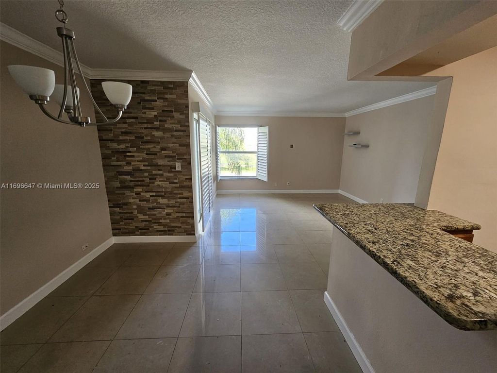 Photo of 455 S Pine Island Rd #305C, Plantation, FL 33324 (MLS # A11696647)