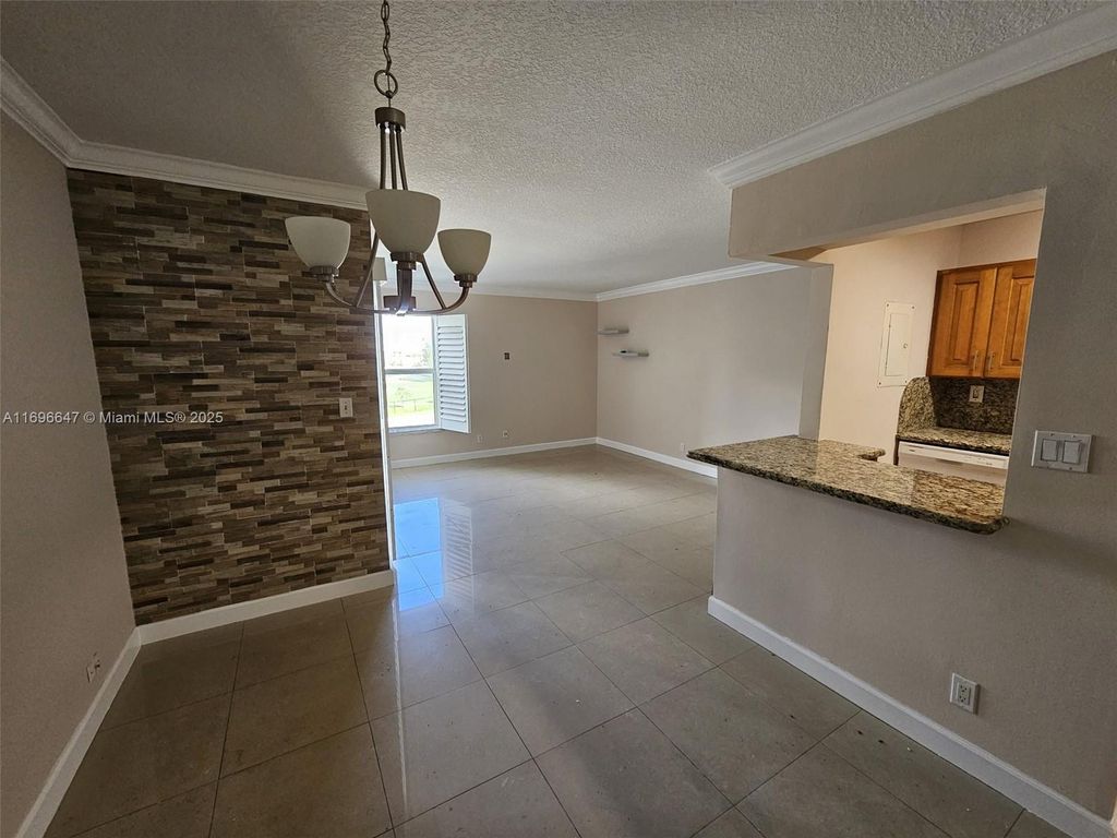 Photo of 455 S Pine Island Rd #305C, Plantation, FL 33324 (MLS # A11696647)