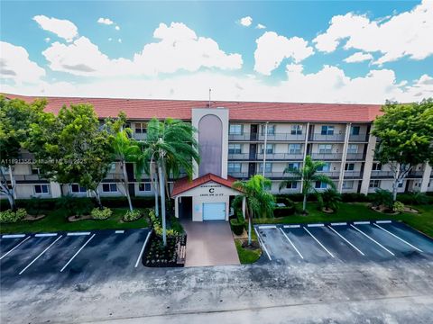 Photo of 13100 SW 11th Ct #107C, Pembroke Pines, FL 33027 (MLS # A11891356)