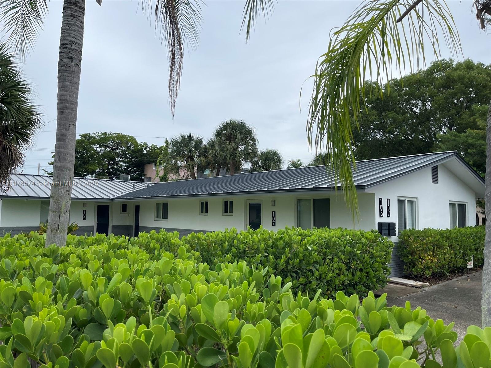 Rare opportunity in Wilton Manors, ideal for personal use with the option to rent out seasonally or for visitors via Airbnb. Located on a cul-de-sac in a quiet neighborhood, across from a green preserve.
Visit the entertainment district with a short walk, or use your car to visit the beach and I95 just minutes away. Both homes have three bedrooms and two bathrooms, all under a metal roof with impact-resistant windows and doors. Three parking spaces per unit, a view of the interior courtyard, and central air conditioning units with updated plumbing and electrical. Modern kitchens with quartz countertops, white cabinetry, and new stainless steel appliances and ice/water dispensers. Bathrooms offer walk-in showers with glass partitions and more.