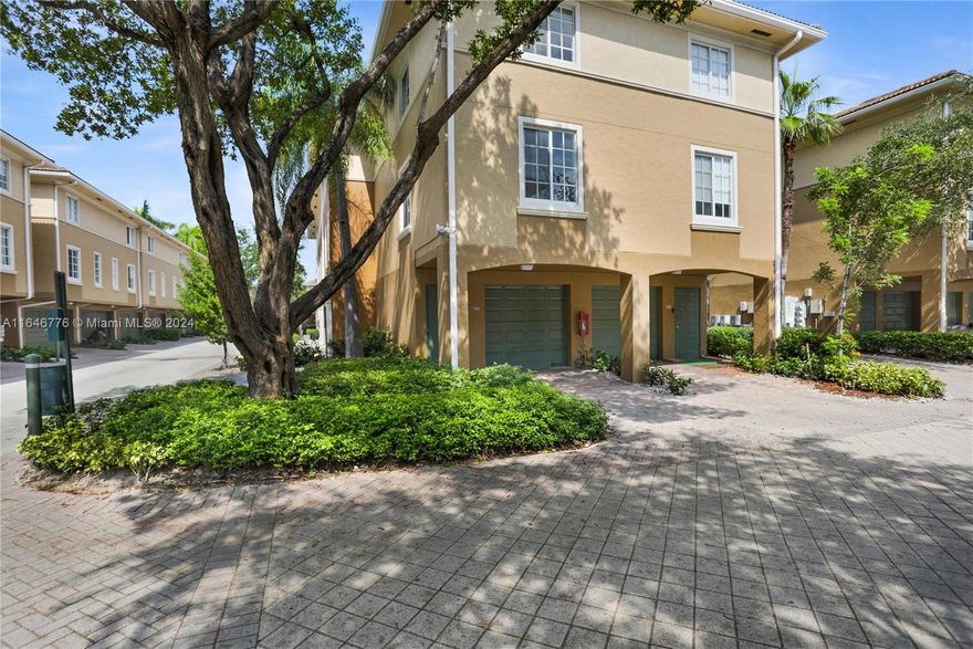 Modern Townhome Corner Condo located in a gated community, fully renovated tri-level, 1-bedroom, 1-bathroom with an upgraded kitchen featuring stainless steel appliances, wood floors, and abundant natural light. Ideal for those who love being within walking distance of top shops, A-rated schools, and parks. Canal-front boardwalk and marina with direct access to the Intracoastal. Includes an attached 1-car garage and driveway for an additional vehicle, a full-size washer and dryer. Community amenities include a resort-style 60 ft pool with a spacious sun deck, gym, and clubhouse. Currently tenant-occupied until October 2025.