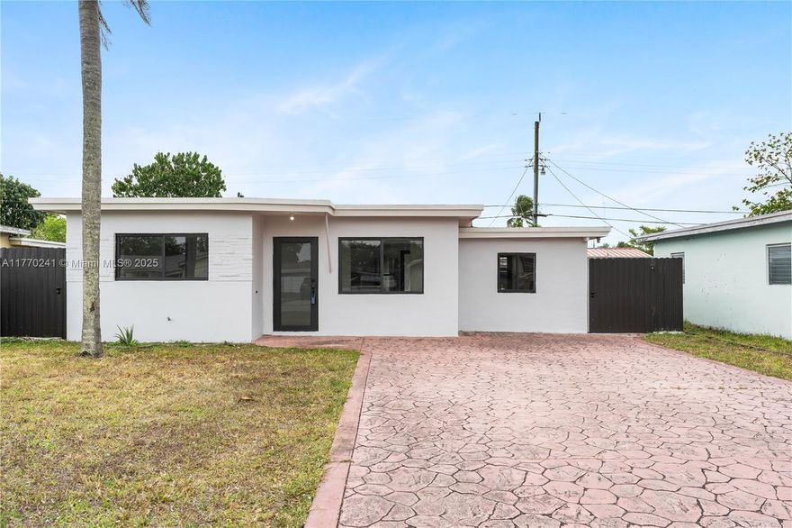 You Must see this beautifull and charming house completetly remodelated with impact doors and window, new roof,new title floor throwout. Enjoy florida weather in a big pool and patio.You can have access to the house from both sides of the property.