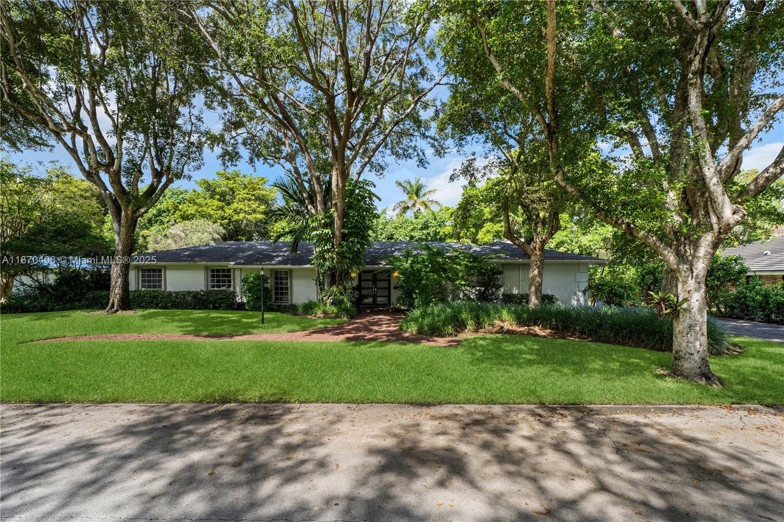 Elegant furnished 4-bedroom, 2.5-bath residence with office in prestigious Pinecrest. This 2,982 SF home showcases marble & wood flooring, a gourmet kitchen with granite countertops, custom cabinetry, and stainless steel appliances. Impact doors & shutters provide peace of mind, while the covered terrace and inviting patio are perfect for entertaining. Set on a 15,301 SF lot at the end of a quiet cul-de-sac shaded by mature oaks. Includes EV charger for convenience. Ideally located just 0.4 miles from top-rated Palmetto Elementary (10/10), Palmetto Middle, and Blue Ribbon award-winning Miami Palmetto Senior High. Minutes to Publix, Whole Foods, Dadeland Mall, fine dining & Metrorail. Experience comfort, style & convenience in one of Pinecrest’s most sought-after neighborhoods!