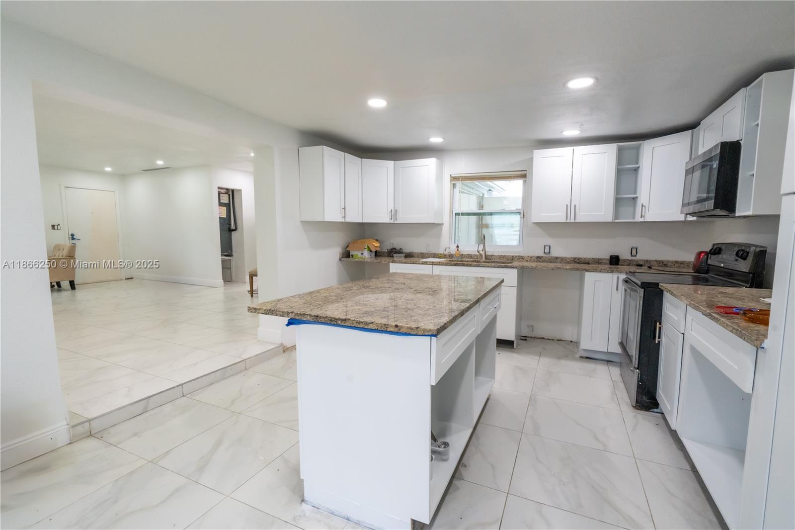 “This home in Lehigh Acres will be delivered fully remodeled, offering the perfect blend of modern comfort and peaceful living. Thoughtfully updated throughout, the property is designed to provide a fresh, move-in ready experience. Enjoy a tranquil setting while still being conveniently located near shopping, dining, and main roadways.”