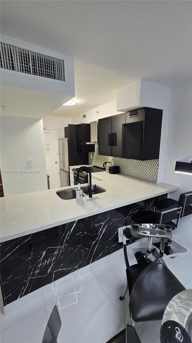 9195 Collins Ave 406