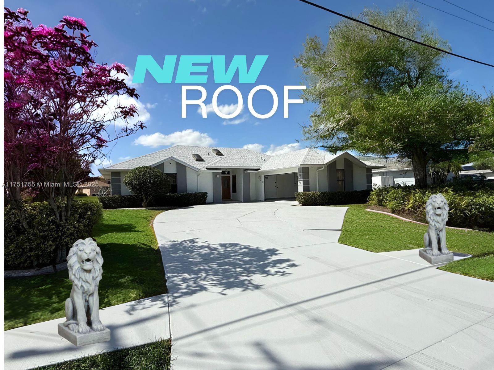 Discover this spectacular CornerHome in the heart of Port St. Lucie, offering ExtremePrivacy and modern comfort! This 3-bedroom, 2-bath home features 3 spacious living areas, perfect for entertaining or relaxing. Recently upgraded with a BRAND-NEW ROOF, NEW GARAGE DOOR, and a NEWLY CODED DRIVEWAY, this home is move-in ready. The beautiful pool boasts torque holes and a color-terminated finish, adding durability and style. Freshly PAINTED INSIDE AND OUT, it exudes a crisp, modern look. Plus, an optional whole-house generator ensures backup power. With two spacious garage spots and a large driveway, this private oasis is a rare find—don’t miss out!