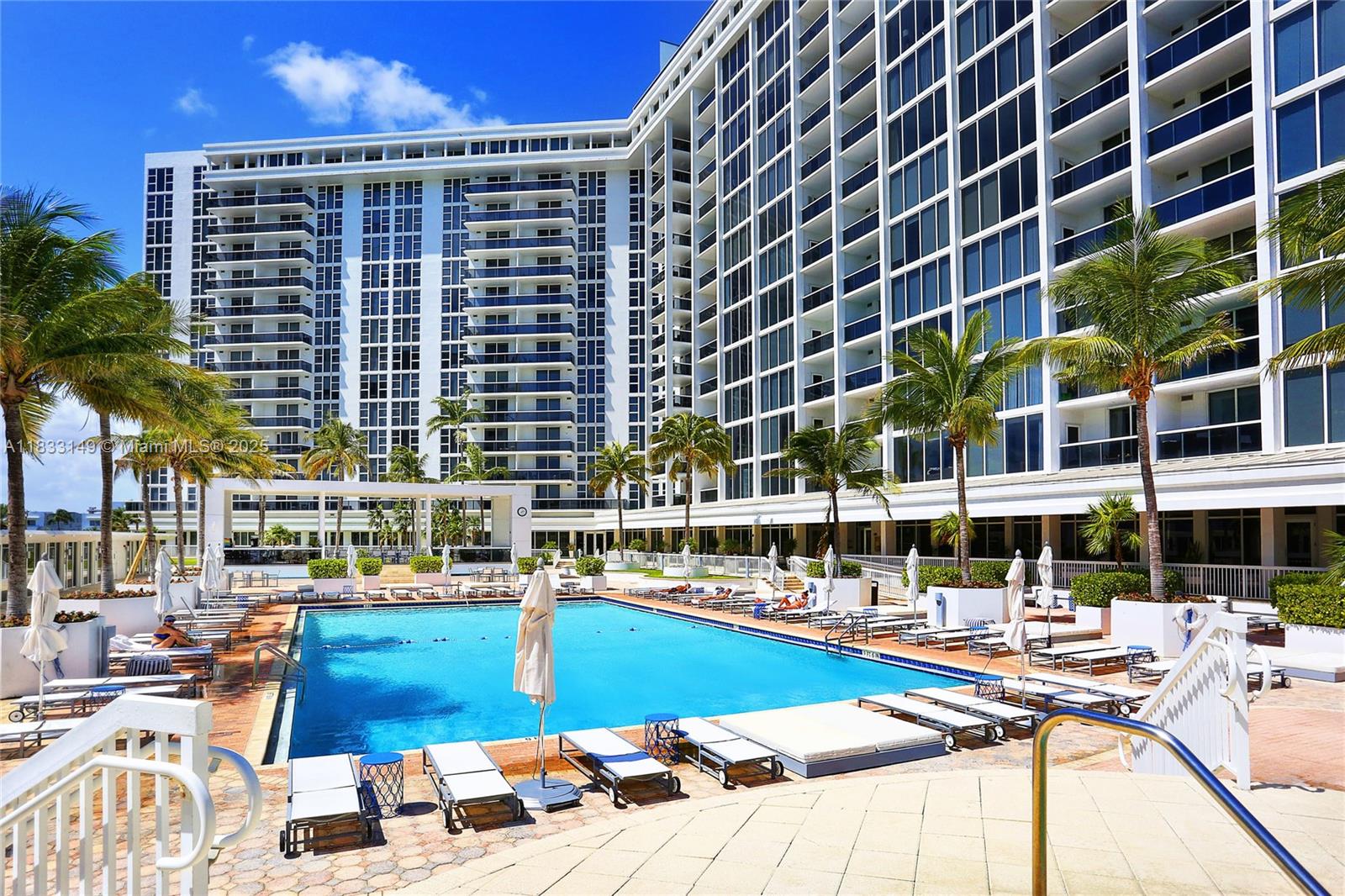 Breathtaking views from this beachfront unit are enticing. Designed and furnished for beachfront living, enjoy spending time in the unit after a beach or pool day while you sit back and admire the views of the Atlantic Ocean and pool terrace. The comfortably furnished 1 bedroom unit offers white porcelain tiles throughout, generous master with en-suite, spacious closets and an additional powder room. Private beach club with one of the most beautiful pool decks in Bal Harbour. The building is full service with 24/7 valet and concierge, newly equipped gym, spa and newly designed lobby, elevator and public spaces. The shops of Bal Harbour and Surfside are just a short distance from this beautifully designed building and unit. WiFi and basic cable are included with the lease.