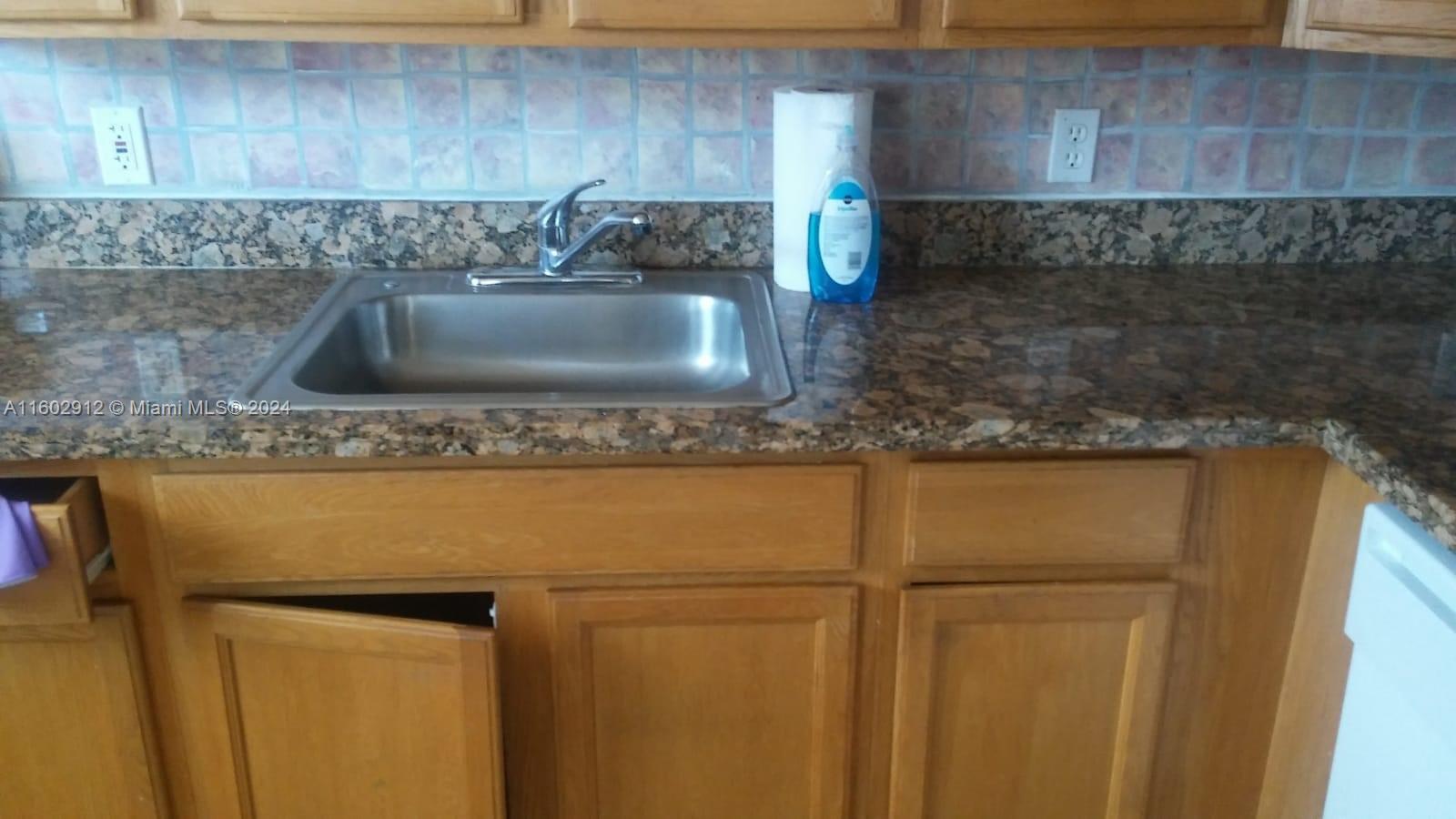 SUTTON HOUSE CONDO - Residential