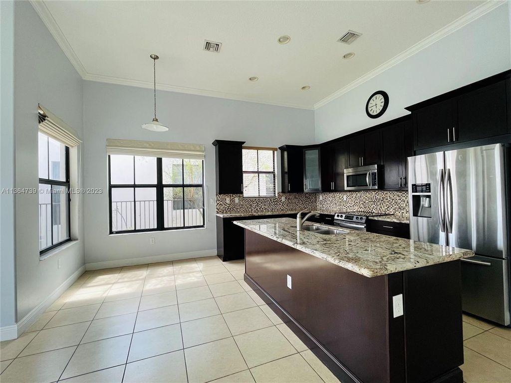 Photo of 8377 NW 39th Ct, Cooper City, FL 33024 (MLS # A11364739)