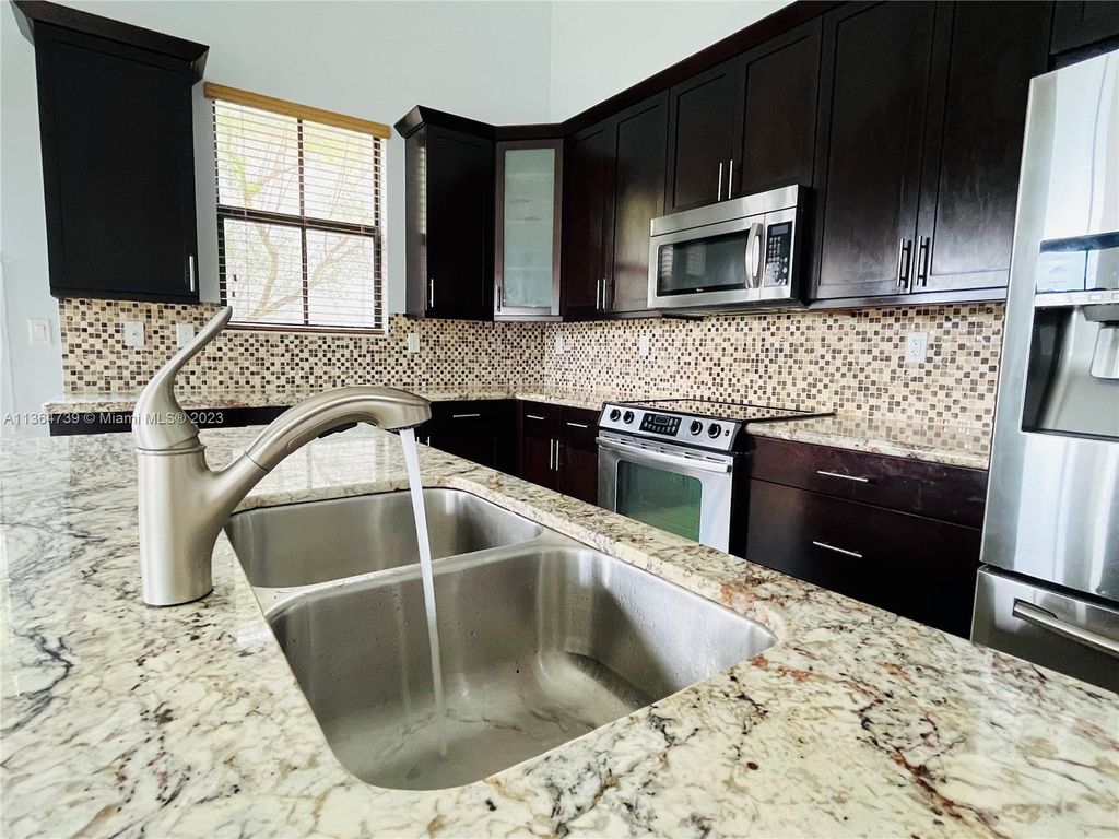 Photo of 8377 NW 39th Ct, Cooper City, FL 33024 (MLS # A11364739)