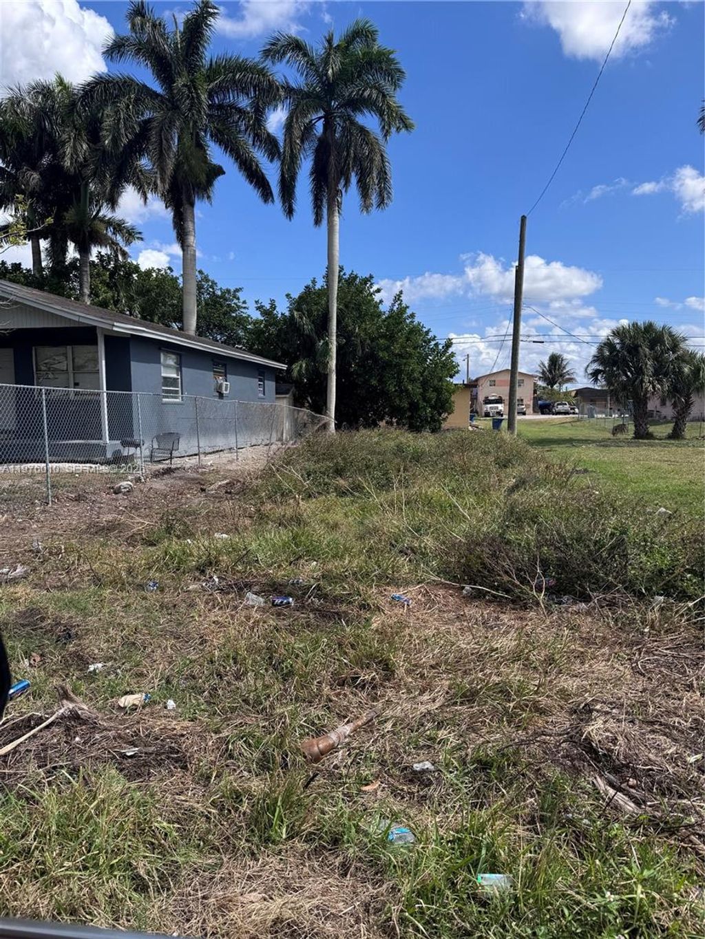 Photo of 609 SW 8th St, Belle Glade, FL 33430 (MLS # A11976010)