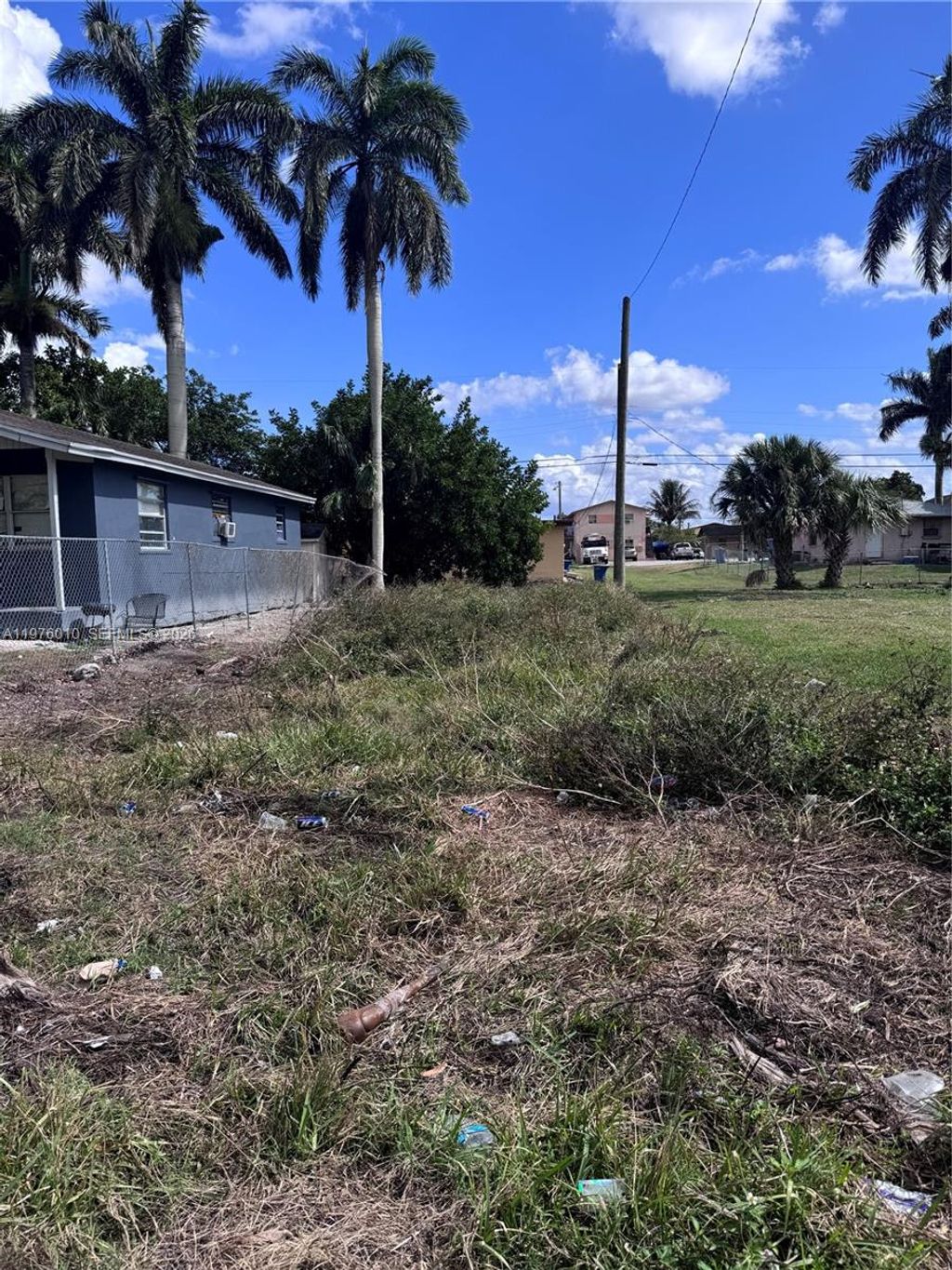 Photo of 609 SW 8th St, Belle Glade, FL 33430 (MLS # A11976010)