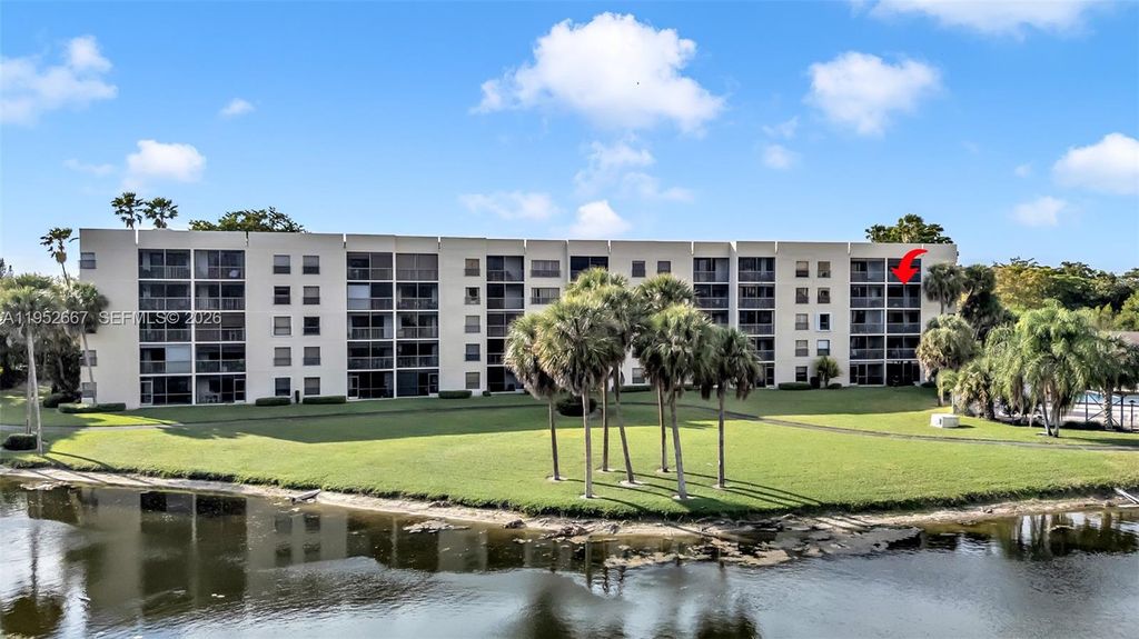 Photo of 2900 NW 42nd Ave #A402, Coconut Creek, FL 33066 (MLS # A11952667)