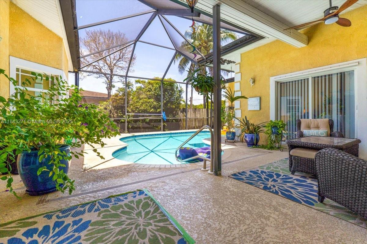 Welcome to this charming 3-bedroom, 2-bathroom home located at 1001 NW 47th St in Fort Lauderdale, FL. This property features a spacious open floor plan with a modern kitchen, stainless steel appliances, and granite countertops. The master suite offers a walk-in closet and a luxurious en-suite bathroom. Enjoy the Florida sunshine in the beautifully landscaped backyard with a covered patio, perfect for entertaining. Conveniently located near shopping, dining, and major highways, this home is a must-see for anyone looking for a comfortable and stylish living space in Fort Lauderdale.